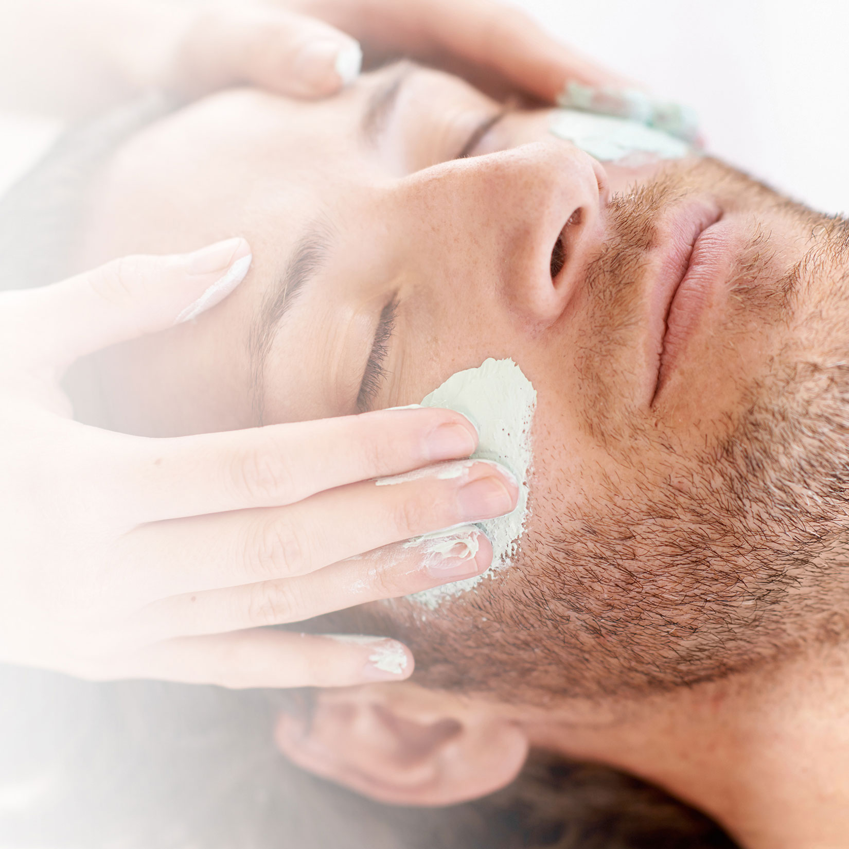 man getting a facial
