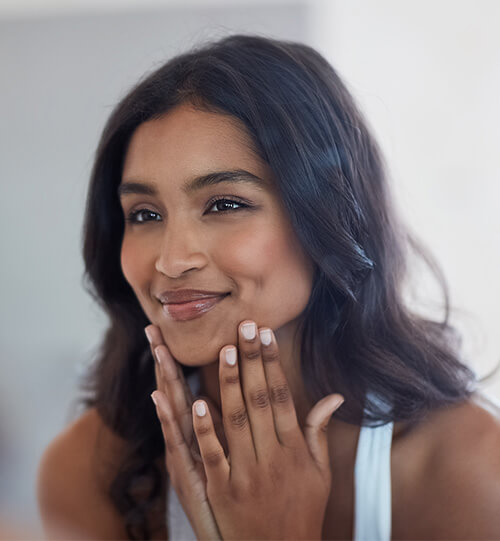 woman after receiving face treatment